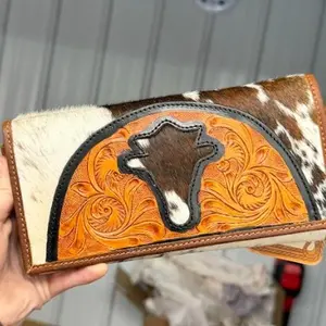 Genuine hand tooled leather & cowhide wallet with wristlet and crossbody strap option