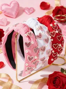 This exquisite and beautiful heart-shaped faux pearl headband for women is the perfect gift for friends and family.  It's suitable for elegant occasions, everyday wear, and is an ideal choice for Valentine's Day. Headbands Women