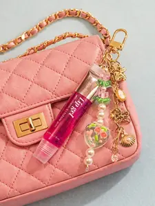 Handcrafted Lip Gloss Charm Key Chain - Unique Handmade Design with Exclusive Beads and Charms for Personalized Purse Accessory