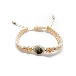 Beige St. Benedict Macrame Bracelet, Crystal-Embellished with Silver Accents, Handmade Craftsmanship Adjustable Sliding Closure Religious Fashion Jewelry Accessory