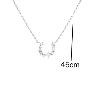 Elegant and simple style women's fashion accessory showing half circle pendant necklace for everyday casual wear