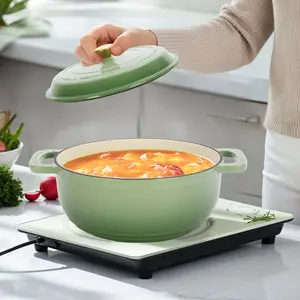 NEWZOME Cast Iron 5QT Cooking Pot Gradient Green Enamel Coating Includes Two Silicone Gloves Heavy Duty Durable Dutch Oven for Stovetop Oven and Outdoor Cooking Perfect for Stews Soups Casseroles and Everyday Meals
