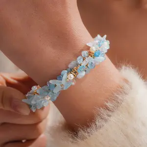 A retro fashion imitation pearl broken gold aquamarine open bracelet