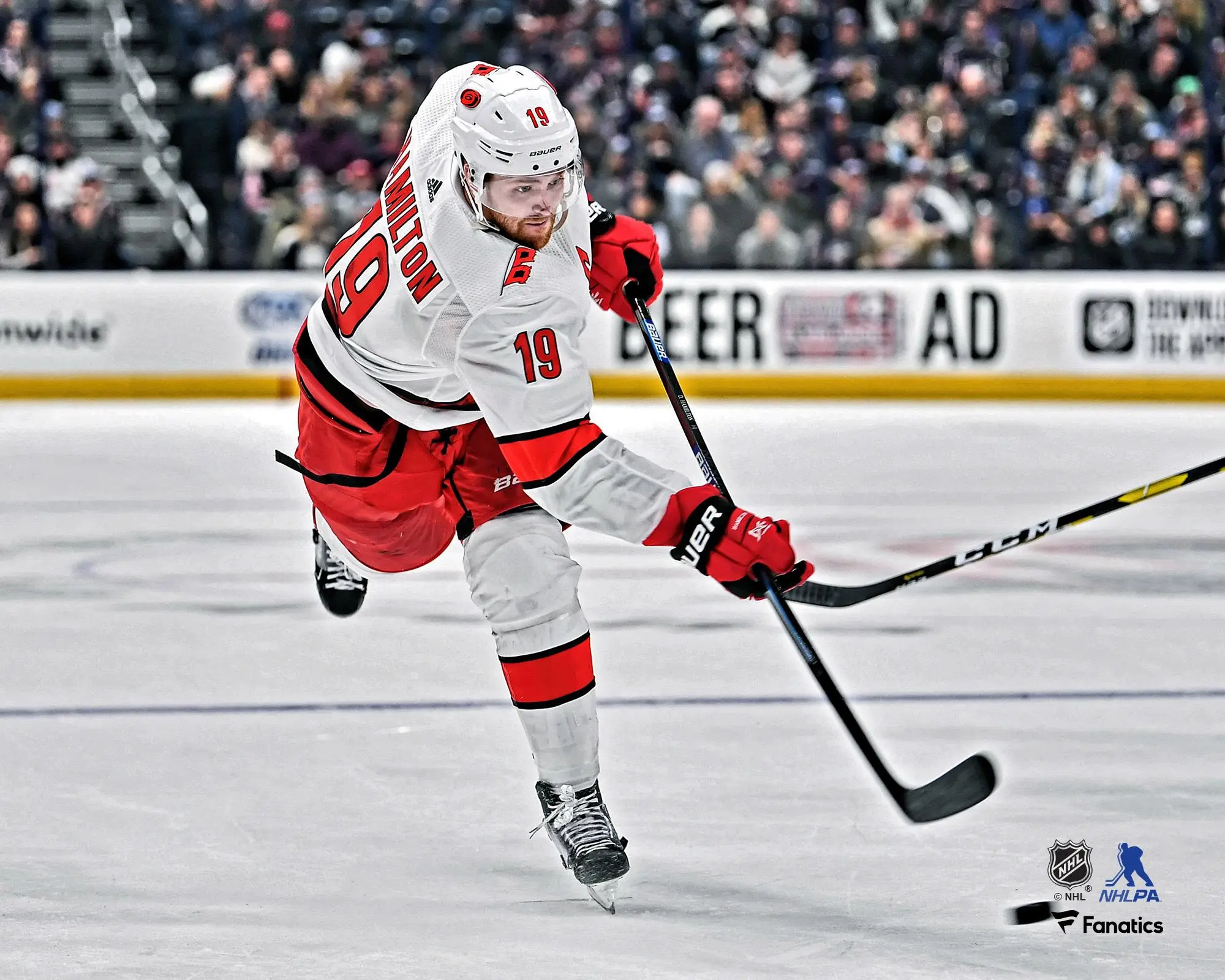 Dougie Hamilton Carolina Hurricanes Unsigned White Jersey Shooting Photograph - NHL Memorabilia