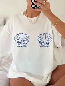 Seashell Print Oversized White T-Shirt | Breathable Cotton Summer Beach Graphic Tee | Coastal Y2K Vacation Casual Top | Soft Lightweight Daily Wear | Mermaidcore Aesthetic Loose Fit Short Sleeve Tee for Women | Perfect for Beach Trips, Summer Vacations &