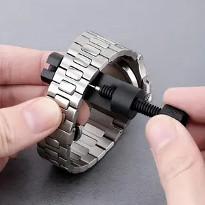 Detacher for watch straps, watch chain adjuster, detaching device for watches, watch strap cutter, watch chain adjustment tool, watch repair tool, watch adjuster