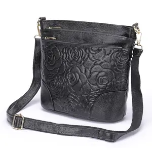 Black Leather Crossbody Bag with Floral Embossing Large Capacity Multiple Zippered Pockets Adjustable Strap Fashionable Shoulder Bag for Everyday Use Daily Commuter Purse