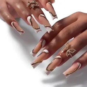 Elegant Gold and White Nail Art Design with Butterfly Accent for Stylish Manicure