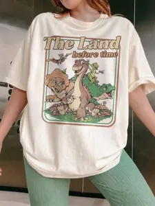 Cream Oversized "The Land Before Time" Retro Cartoon Casual Tee - 2026 Trending Streetwear, Soft Cotton Fabric Perfect for Fan Events & Daily Outings, Bold Nostalgic Print That Stands Out, Versatile Relaxed Fit