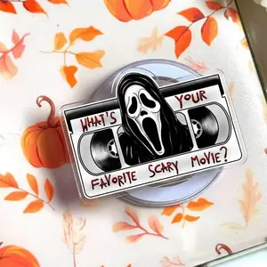 Ghostface Phone Grip Retro VHS Tape Design What's Your Favorite Scary Movie Phone Stand Horror Aesthetic Phone Holder Trendy Halloween Accessory Scary Movie Lover Gift Unique Tech Decor