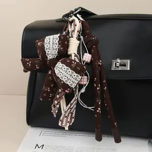 Puffy Floral Bow Keychain Charm for Women, Cotton Filled Lace Bowknot Key Ring Pendant with Twisted Rope Strap, Cute Coquette Purse Charm Accessory for Handbag Backpack Car Keys Girls Gift