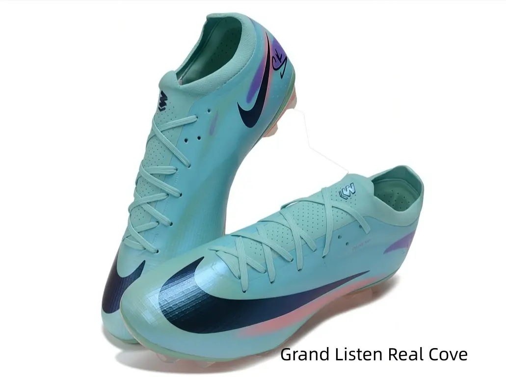 Pastel mint firm-ground soccer cleats with gradient purple-pink graphic accents
