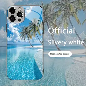 Featuring a beach and palm tree scene, this non-slip TPU full-coverage lens-plated silver glass phone case is compatible with iPhone 17, 16, 15, 14, 13, 12, 11, and Samsung models. It makes a great gift for friends or family.