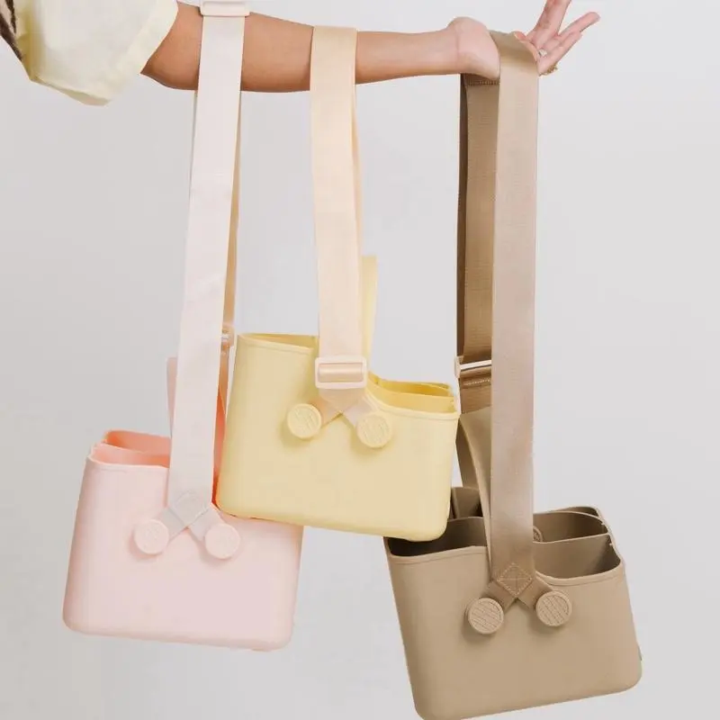 BEVVY TOTE - An Adjustable/washable silicone tote for bevvy enthusiasts. Take your coffee, water, protein and smoothie all in one place without spilling all over your car on the way to work. 