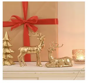 2Pcs Resin Reindeer Figurines for Christmas Decor Gold Tabletop Reindeer Statues Small Decorative Deer Figurines for Indoor Christmas Tabletop Mantle Decorations