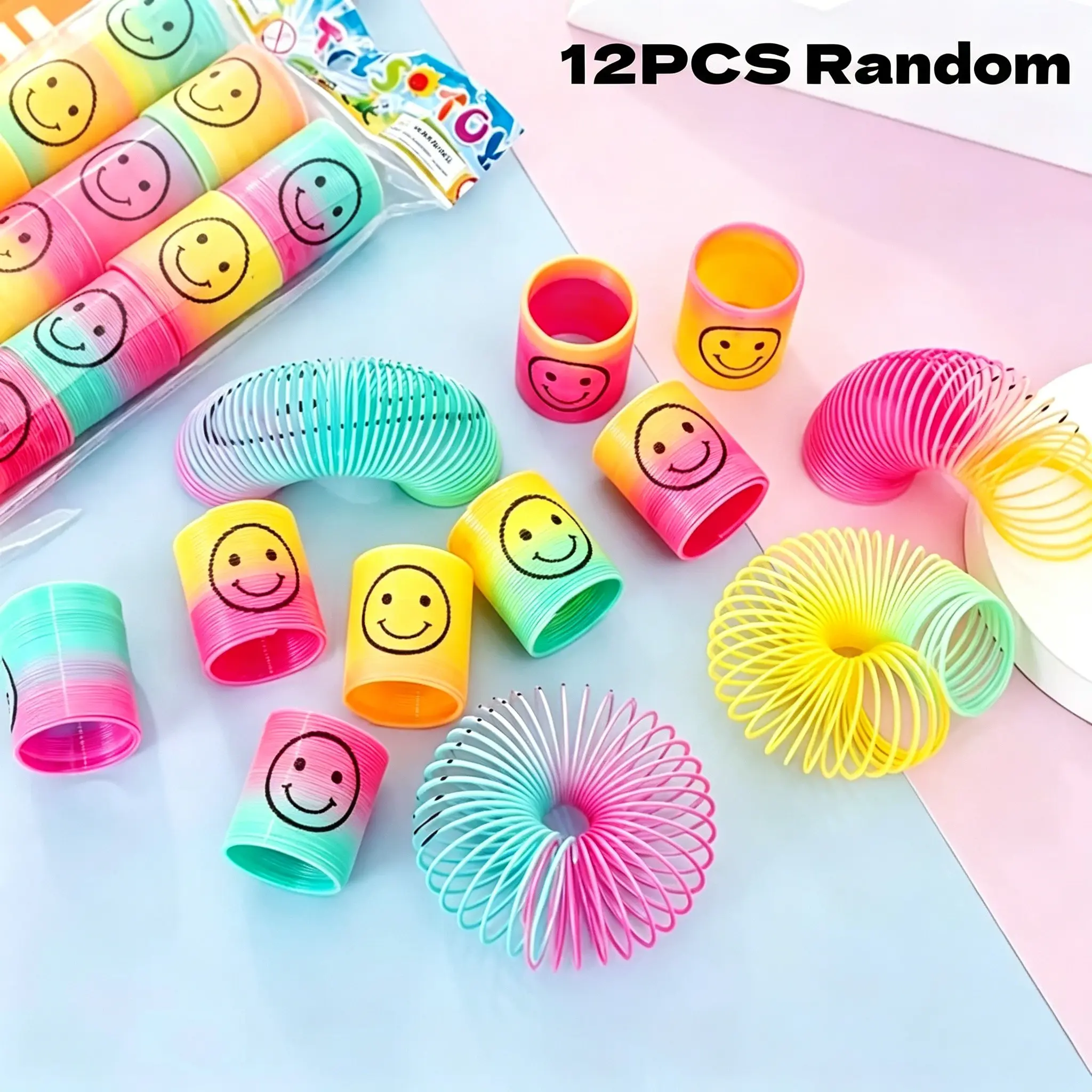 12 Pcs Vibrant Colorful Plastic Slinky Toys, Happy Face Rainbow Design, Birthday/halloween/christmas Party Favors, Fun Gifts for Teens, Holiday Event Supplies