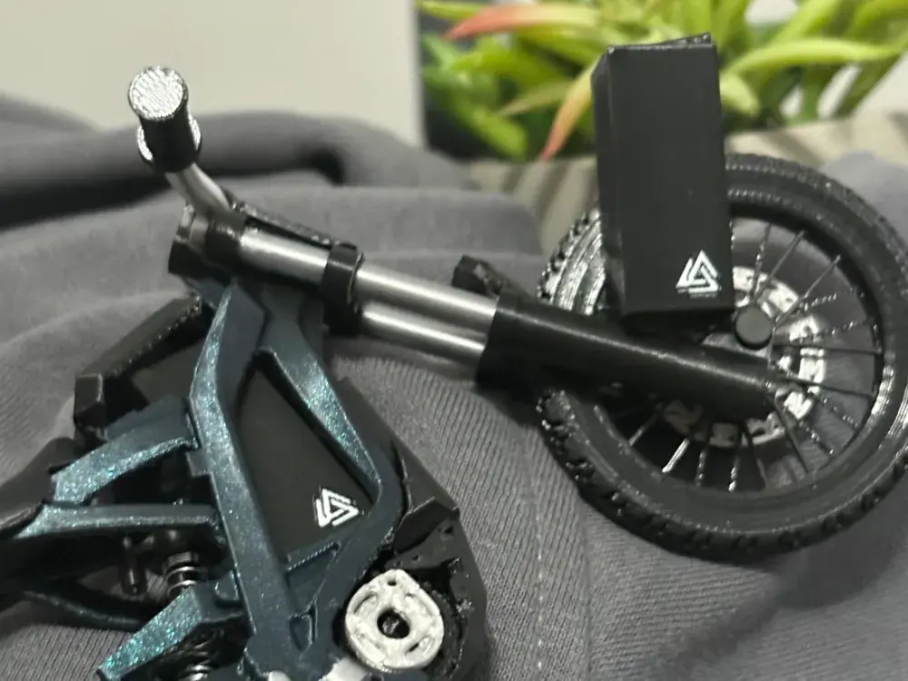 Mini 3D Printed Surron with Fully Working Suspension Compact Design Versatile Use Easy to Carry Functional Accessory