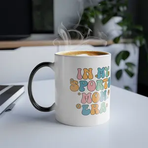 In My Sports Mom Era Magic Mug | Color Changing Heat Reactive Cup | Fun Gift for Sports Moms | 11oz Ceramic Black-to-White Reveal Mug
