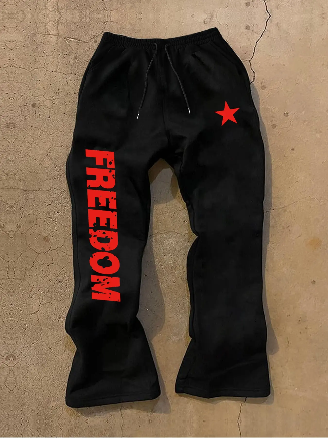 Men's printed baggy sweatpants featuring star and letter patterns. The comfortable, relaxed fit and pockets make them ideal for everyday casual wear with athleisure design. Athleisure Style Bottoms