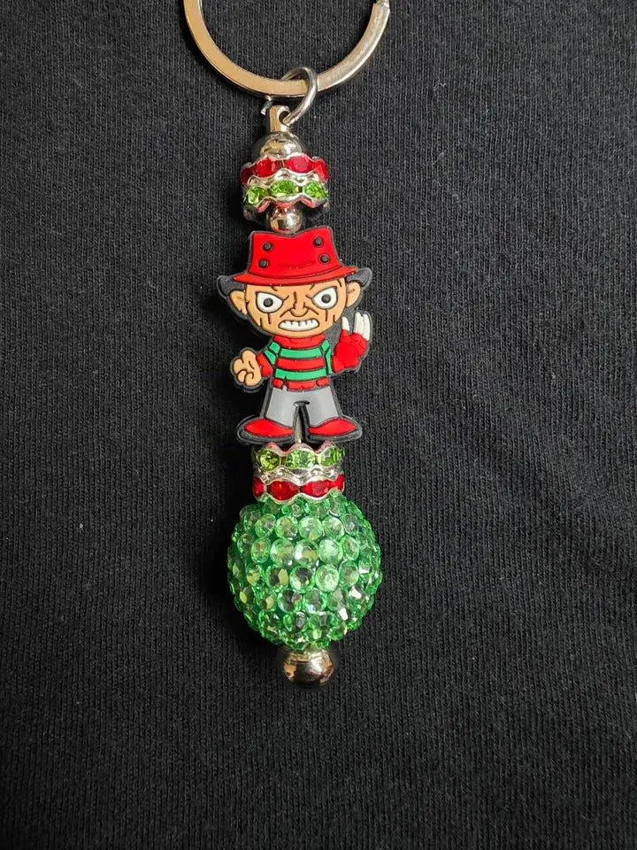 Freddy Keychain - Iconic Freddy Krueger from Nightmare on Elm Street High-Quality Horror Fan Accessory with Small Parts Not for Children Under 3