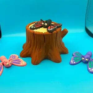 Fidget butterflies with tree stump