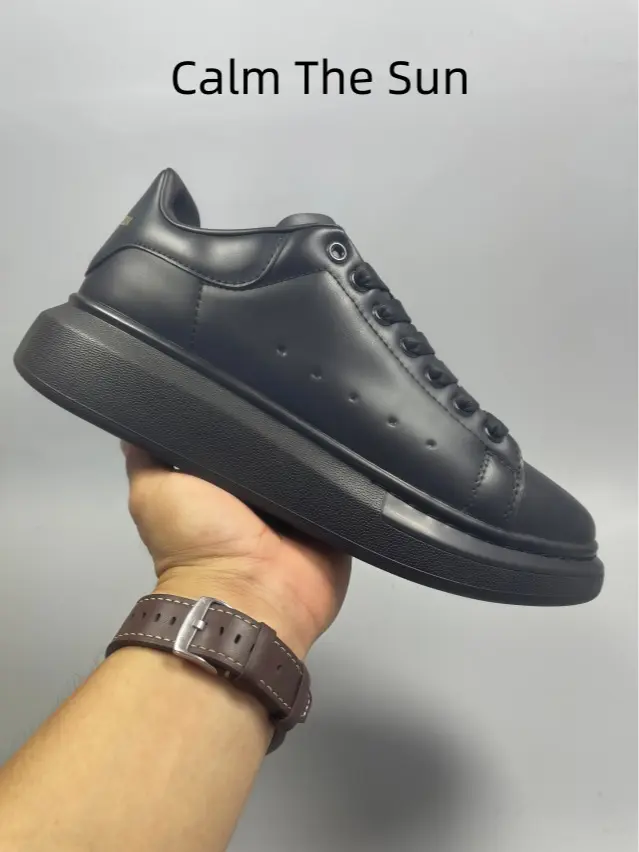 Clean solid matte black platform athletic shoes with uniform tone design and low-key rear tiny logo, fit all dark minimalist streetwear, layered casual fits and understated elegant daily clothing combinations for men.
