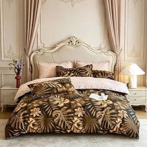 Bohemian Jungle Leaf Print 2/3 counts Bedding Set: Breathable polyester duvet cover with zipper closure (does not include filling). Stylish black-and-gold tropical-themed bedding set includes pillowcases, suitable for queen or king-size beds.
