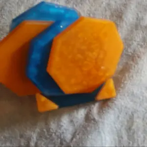 blue and orange octagon resin coasters with holder
