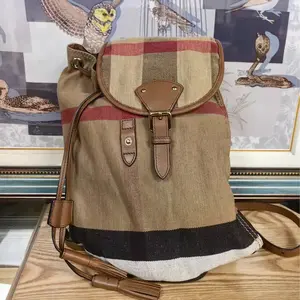 Pre-owned BURBERRY Classic Check Canvas Backpack Bucket Bag Unisex Luxury Designer Daily Bag with Leather Trim and Adjustable Straps Iconic British Heritage