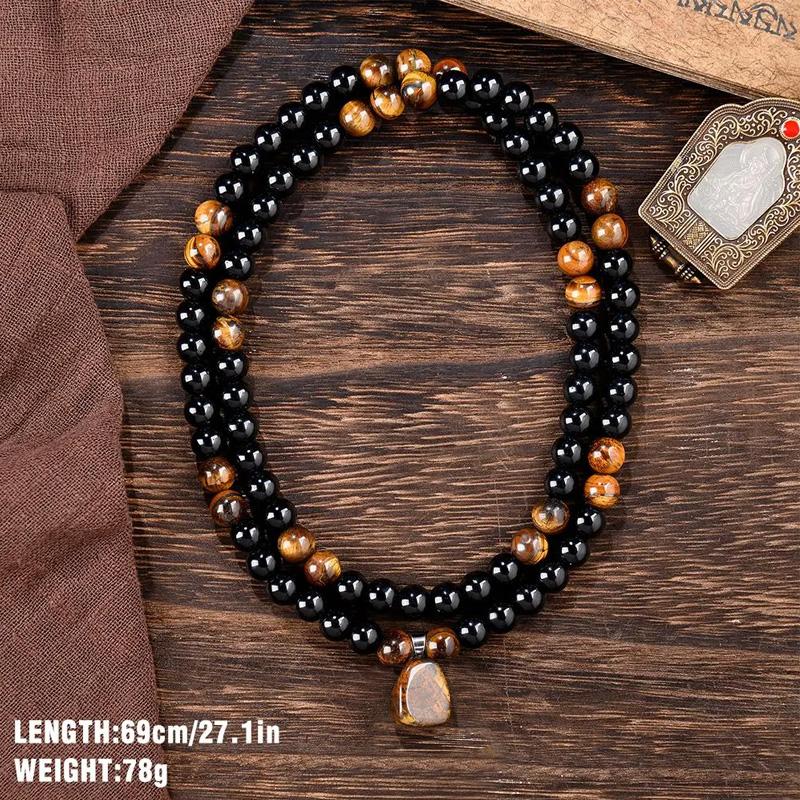 GEMRICH Prosperity necklace featuring a tiger’s eye stone pendant, crafted from healing crystals and obsidian. Suitable for anniversary celebrations, vacations, and themed parties; combines jewelry charm with abundant crystal energy—an ideal gift.