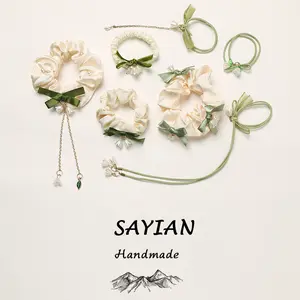 SAYIAN Handmade Feng Shui Brand 7 pcs Set Lucky Jasmine Scrunchies Soft Stretchy Detachable Hair Ties for Ponytails Hair Elastics Spiral Hair Ring Cute Accessories Pixiu Wealth Charm Gold Plated Pixiu Unisex Design Adjustable Cord Green Stone Beads