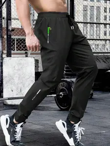 Men's Sports Joggers Athletic Pants Quick Drying Fitness Trousers Breathable Elastic Training Pants Casual Running Slim Pants