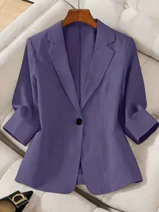 A women's solid color lapel single-breasted single-button mid-length sleeve double-pocket stylish blazer, suitable for spring and autumn, appropriate for the workplace and daily wear.