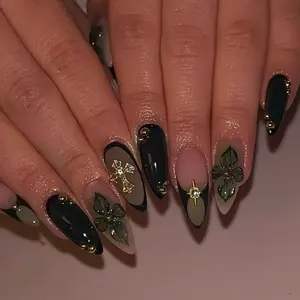 SHEDARES Emerald Luxe – Luxury Handmade Stiletto Press-On Nails with Dark Green Chrome, 3D Floral Petals & Gold Cross Charms – Perfect for Glam Nights & Holiday Parties