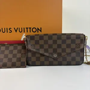 Pre-owned Louis Vuitton Monogram Canvas Crossbody Bag with Chain Strap and Brown Colorway