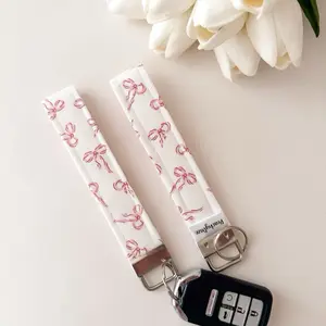 Pink Bow Keychain Wristlet - Bow Pattern, Gold Clip, Adjustable Design, Ideal for Keyring Use