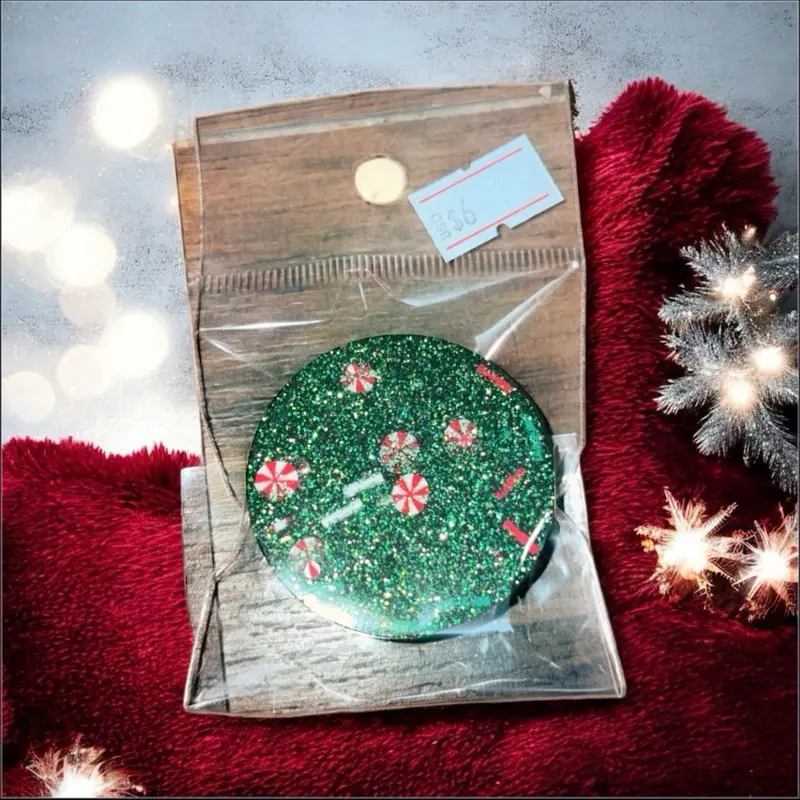 Handmade Christmas Resin Pop Socket with Glittery Green Base and Festive Peppermint Design Perfect for Holiday Gifts