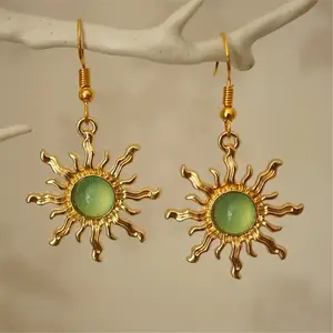Gold Sunburst Drop Earrings with Green Cat Eye Stone Boho Vintage Inspired Jewelry Featuring Wavy Sun Rays Design Perfect for Summer Beach Days and Bohemian Outfits Cross Necklace ring Surgical Steel Stud Set Mesh Water men's whimsical dad tiara men