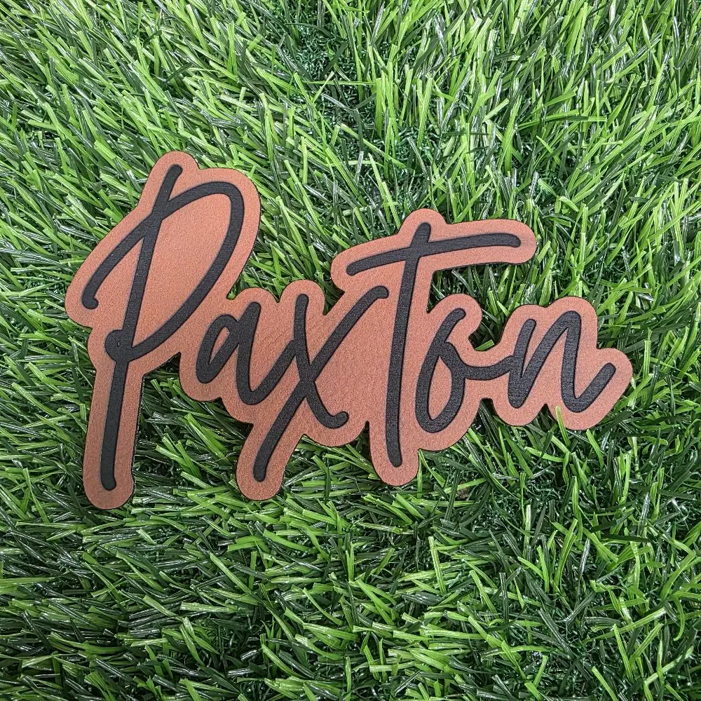 Custom name iron-on leatherette patch.
