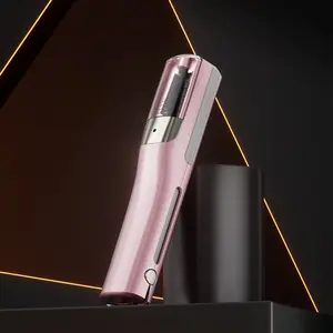 The ergonomic handle of the women's charging split hair clipper - a 2-in-1 hair cutting and split hair removal device, designed in pink and black, is perfect for caring for damaged hair. The split hair clipper can achieve salon quality results at home, co