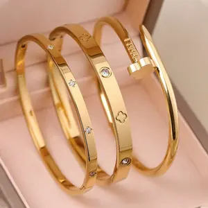 Fashionable gold-plated four leaf clover diamond inlaid open bracelet for women, light luxury and versatile, layered stainless steel bracelet
