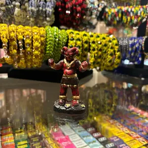 Small red Mammon statue