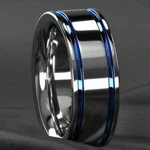 Fashionable men's wedding/engagement ring in silver plating with blue grooves, decorated with a shiny and beautiful finish. Men's jewelry.