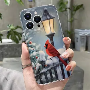 Winter snow scene with red finches and streetlight design. This TPU full-coverage phone case features a shockproof and non-slip design, suitable for iPhone 17, 16, 15, 14, 13, 12, 11, XS, X series, and more. It makes a great gift for friends or family.