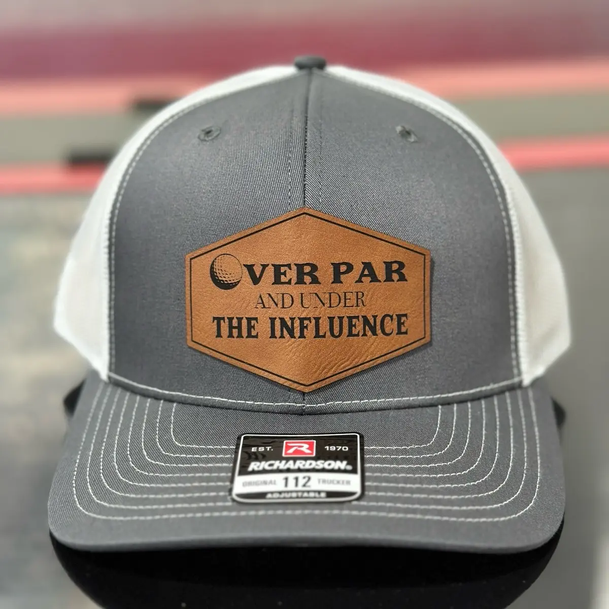 Over par and under the influence, golf hat