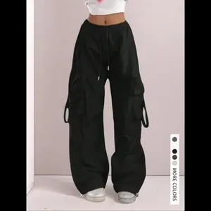 High Waist Drawstring Comfortable Wide Leg Cargo Pants, Elastic Cuffs and Fold over Pockets for Casual Street Style Bottoms Fabric