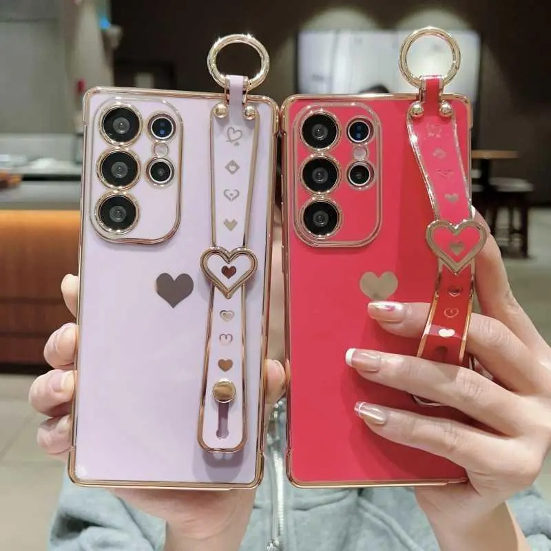 For Samsung Galaxy S26 Ultra Premium Electroplated Heart Phone Case For Samsung Galaxy A27 Wrist Strap Stand For Samsung Galaxy A57 Full Cov HNAC27PLQWE