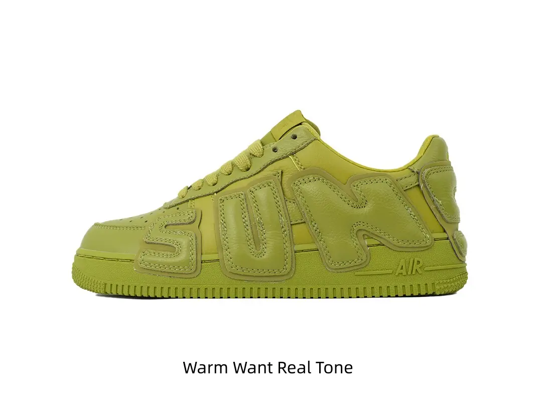 Solid matte lime green smooth leather low top casual skate sneakers oversized 3D raised letter side graphic circular ripple anti slip rubber outsole men women bold monochrome street walking fashion shoes