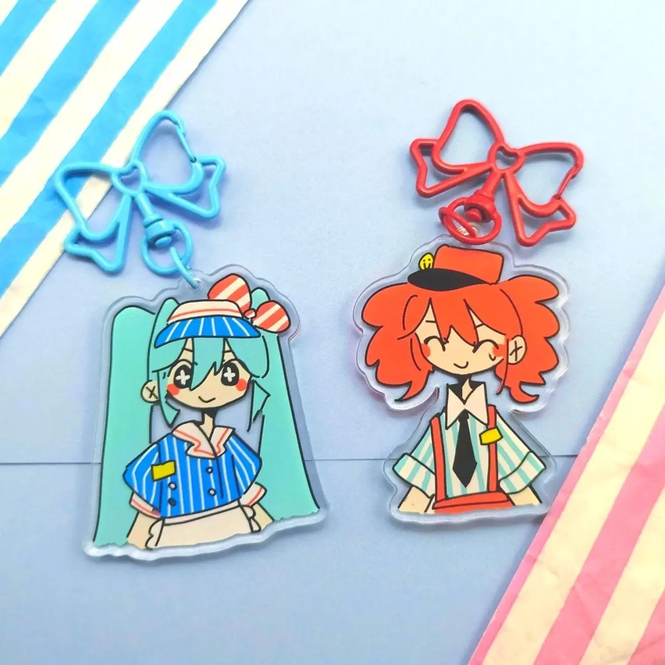 2 ops miku and teto mesmerizer keychains
