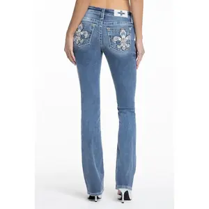 MissMe Shelly Fleur Bootcut Jeans Mid Waist Below the Ankle Washed with Embroidered Fleur-de-lis Back Pocket Leather Appliqué Accents